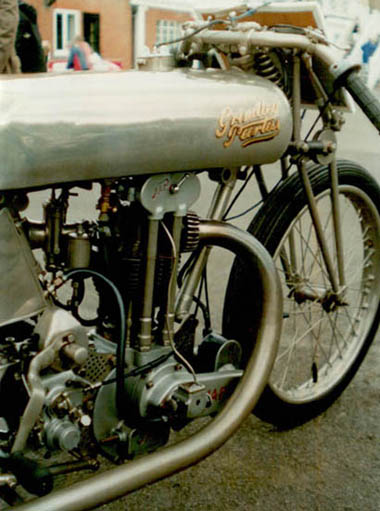 Two race Nortons at home